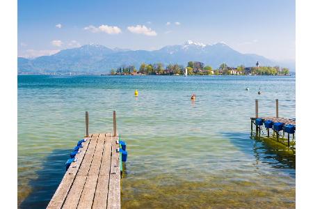 Auch am Chiemsee, am Fuß der bayrischen Alpen, können Sie sich in einen tollen Wettkampf stürzen. Bei diesem Ausblick sollte...