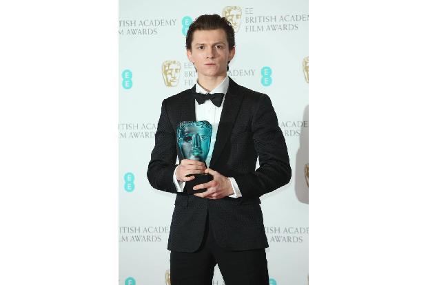 ...der Auftritt von Tom Holland auf der Bühne der EE British Academy Film Awards 2017. Ausgezeichnet als bester Nachwuchssta...