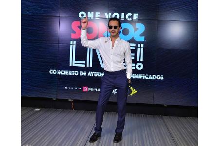 ...ihrem Ex-Mann Marc Anthony zusammengetan, um ihren eigenen TV-Gig, 'One Voice: Somos Live! A Concert for Disaster Relief'...