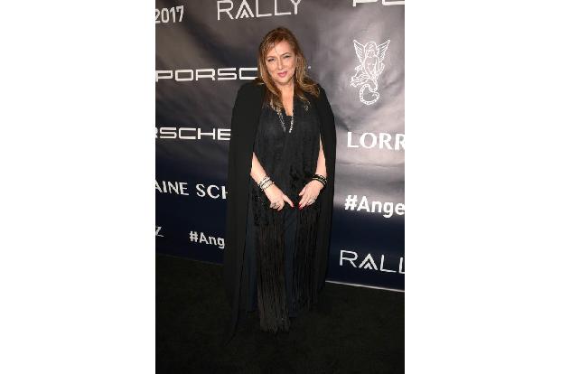 ...von roten Teppichen eigentlich gut kennt, ist diese Dame hier: Allerdings sieht man oft nur ihren Schmuck, Lorraine Schwa...