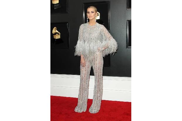 …Sängerin Ashlee Simpson in diesem Look. Ein beeindruckender Beweis dafür, wie schnell aus einem schönen ein sterbender Schw...