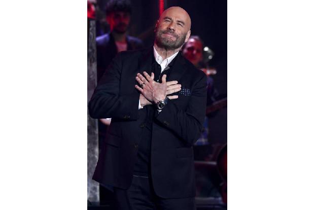 So sehen Geburtstagskinder aus: John Travolta hat sich passend zu seinem Ehrentag einem Make-over unterzogen und trägt seit ...