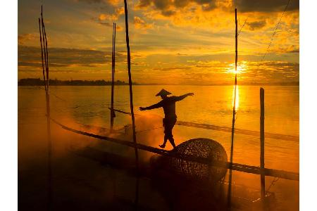 Im Mekong-Delta von Kambodscha gibt es noch viele Fischer - die müssen bei ihrem Handwerk allerhand Geschick beweisen