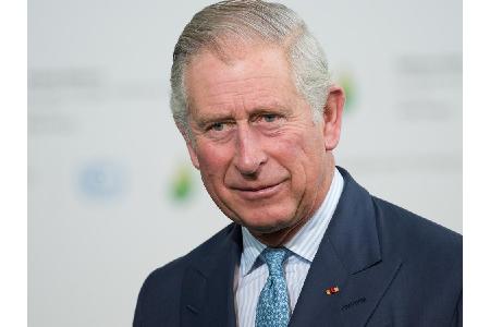 ... natürlich auch dessen Papa Prinz Charles...