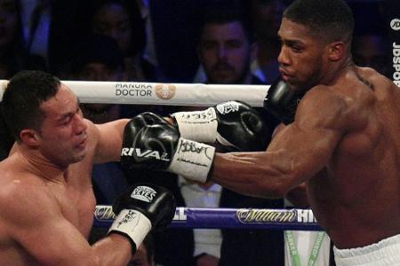 Klitschko-Bezwinger Joshua gewinnt Vereinigungskampf gegen Parker