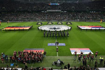 Rassistische Ausfälle gegen Nationalspieler - drei Männer stellen sich