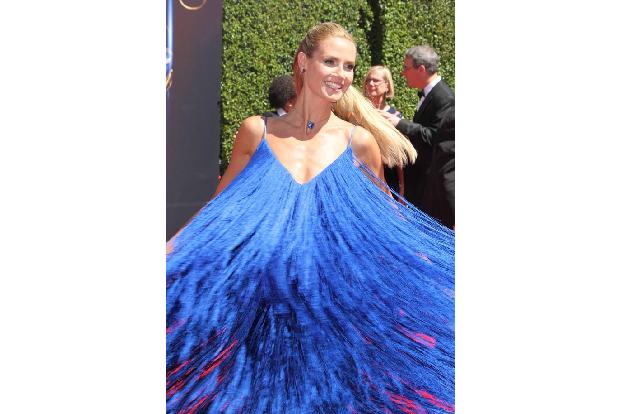 Huch! Wie sieht die denn aus?! Normalerweise glänzt Heidi Klum auf dem roten Teppich in stilvollen Roben und sorgfältig ausg...