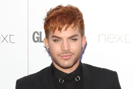 Musiker Adam Lambert liebt den extravaganten Auftritt - gefärbte Haare sind da fast schon ein Muss.