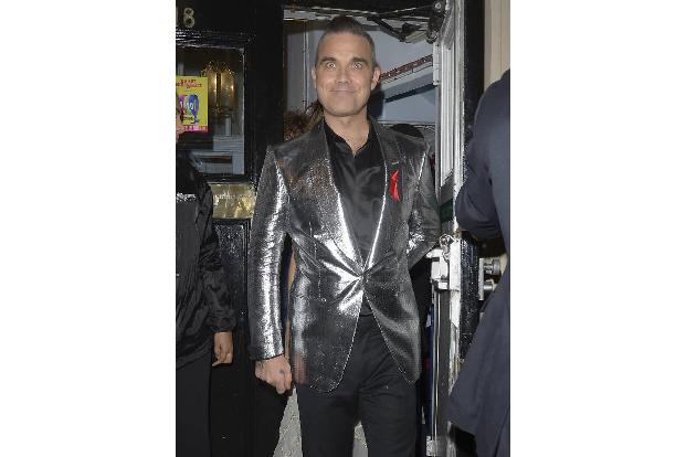 ...Robbie Williams zuteil, der kürzlich von Weight Watchers eingespannt wurde. Der Barde erwiderte stolz: 