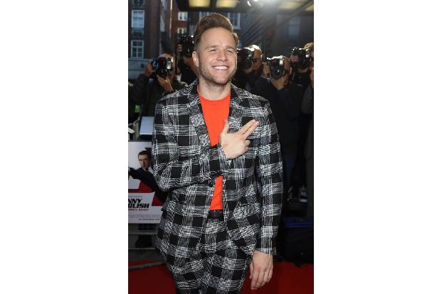 ...Olly Murs seine Aufwartung zur Premiere des Streifens - obwohl er weder Musik für den Film beigesteuert hat, noch in eine...