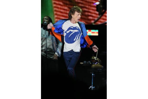 ...Drogenskandale um die Band befeuerten das wilde Image noch. Hinzu kam ein Frontmann, der wie ein Derwisch über die Bühne ...