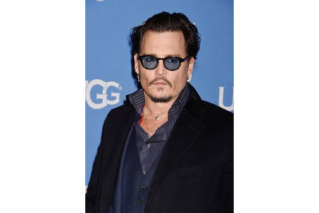 ...mit der 22 Jahre jüngeren Kollegin wirkte Johnny Depp oft wie in einer Midlife-Crisis, präsentierte sich fast ausschließl...