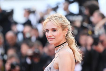Zu Ehren der 70-Jahr-Feier der Filmfestspiele von Cannes trug Diane Kruger ein Kleid von Prada - doch das war nicht die einz...