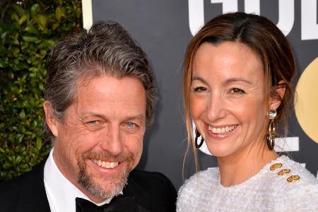 Hugh Grant mit seiner Ehefrau Anna Eberstein