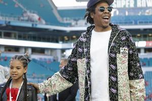 Blue Ivy Carter mit Vater Jay-Z beim Super Bowl in Miami.