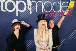 Milla Jovovich (v.l.) mit Heidi Klum und Julien Macdonald