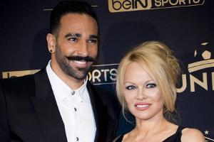 Pamela Anderson mit Adil Rami bei einem gemeinsamen Auftritt in Paris