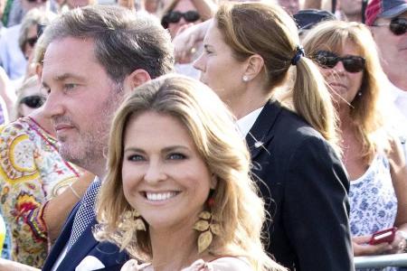 Prinzessin Madeleine von Schweden mit Christopher O'Neill im Hintergrund