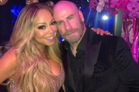 Mariah Carey feiert mit John Travolta