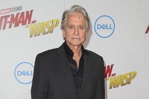 Michael Douglas findet, dass Angela Merkel etwas Beruhigendes hat