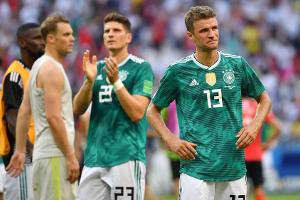 Thomas Müllers (r.) Gesicht nach dem Abpfiff sprach Bände