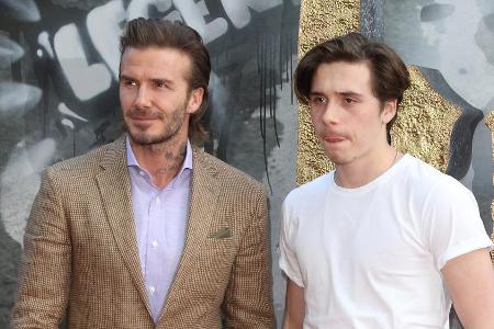Wie aus dem Gesicht geschnitten: David Beckham (li.) mit Sohn Brooklyn