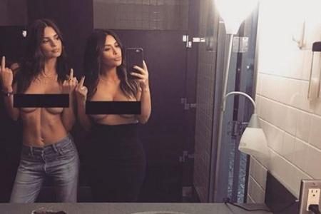 Vor dem Überfall auf sie im Oktober postete Kim Kardashian regelmäßig sexy Schnappschüsse, wie hier gemeinsam mit Model Emil...