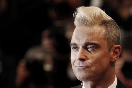 Desinfektionsmittel hat Robbie Williams offenbar immer dabei