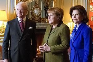 Kanzlerin Angela Merkel (Mitte) mit dem König und der Königin von Schweden