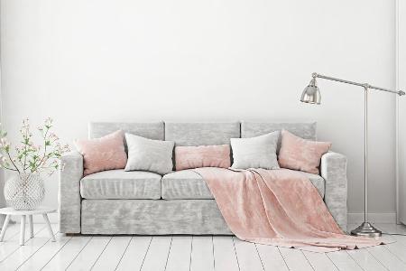 Kissen in Pastelltönen sorgen für ein gemütliches Ambiente