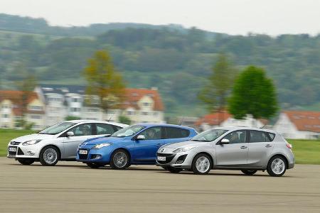 Ford Focus 1.6 ECOBOOST, Mazda 3 2.0 MZR i-STOP, Renault Megane TCe 130, alle Fahrzeuge, Seitenansicht
