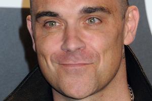 Robbie Williams plant eine Reunion mit seiner alten Band Take That