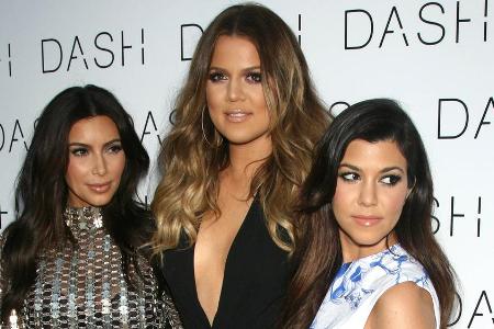 Die Kardashian-Schwestern Kim (l.), Khloé (M.) und Kourtney bei der Eröffnung ihrer Dash-Boutique in Miami Beach
