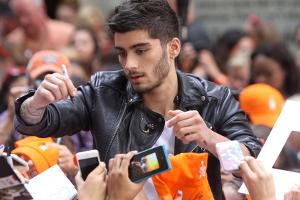 Schon damals manchmal allein auf weiter Flur: Zayn Malik bei einem One-Direction-Konzert im Jahr 2013