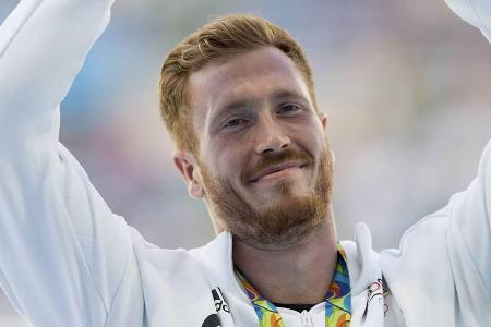 Christoph Harting freut sich in Rio übre seine Goldmedaille