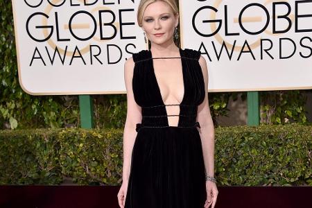 Ein gewagtes Kleid von Valentino trug Kirsten Dunst zu den Golden Globes. Fast bis zum Bauchnabel ließ die ärmellose Robe bl...