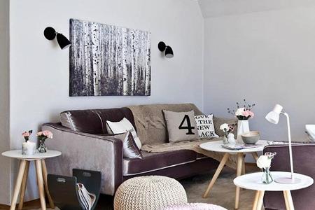 Viele kleine Fotos oder Bilder an der Wand sorgen für Unruhe. Lieber für ein großes Bild entscheiden.