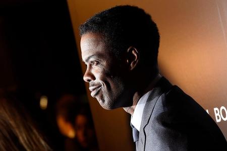 Chris Rock hat allen Grund zu grinsen: Der Star wird den prestigeträchtigen Posten des Oscar-Moderators übernehmen