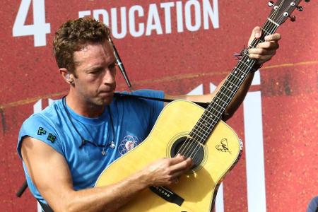 Ob Chris Martin wohl so abrocken kann wie Axl Rose?