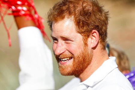 Trotz des ernsten Anlasses kann Prinz Harry bei seiner Charity-Reise durch Südafrika strahlen