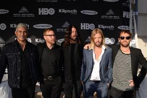Die Foo Fighters um Frontmann Dave Grohl (m.) bei der Rock and Roll Hall of Fame Zeremonie