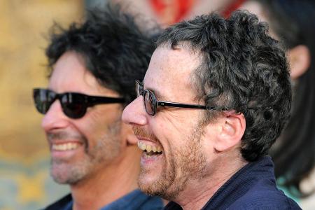Joel (l.) und Ethan Coen haben diesmal in Cannes das Sagen