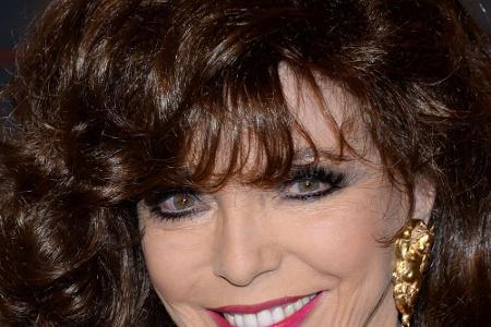 Joan Collins wurde von Prinz Charles geehrt