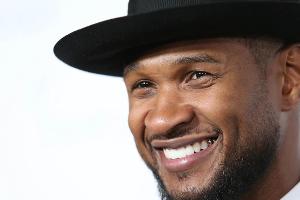 Usher hat gute Gründe zu lachen: Er ist frisch verlobt