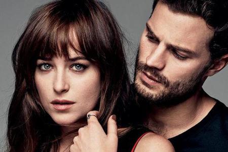 Dakota Johnson und Jamie Dornan posieren für das 