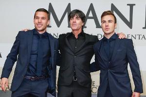 Drei Protagonisten der WM 2014: Lukas Podolski, Jogi Löw und Mario Götze (v.l.n.r.)