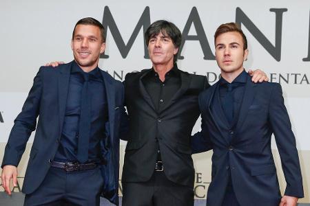 Drei Protagonisten der WM 2014: Lukas Podolski, Jogi Löw und Mario Götze (v.l.n.r.)