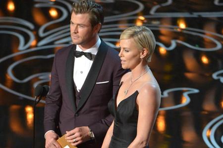 Charliza Theron und Chris Hemsworth bei der Oscar-Verleihung 2014