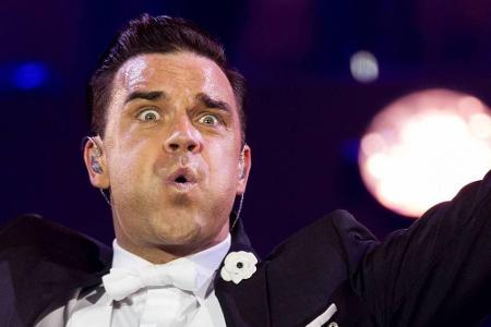 Ups, das ging wohl daneben: Robbie Williams ist von der Bühne gefallen