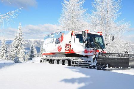 Mit dem 300 PS starken Pistenbully durch die Schneelandschaft